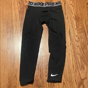 Nike Black Kids Compression Leggings with White Swoosh